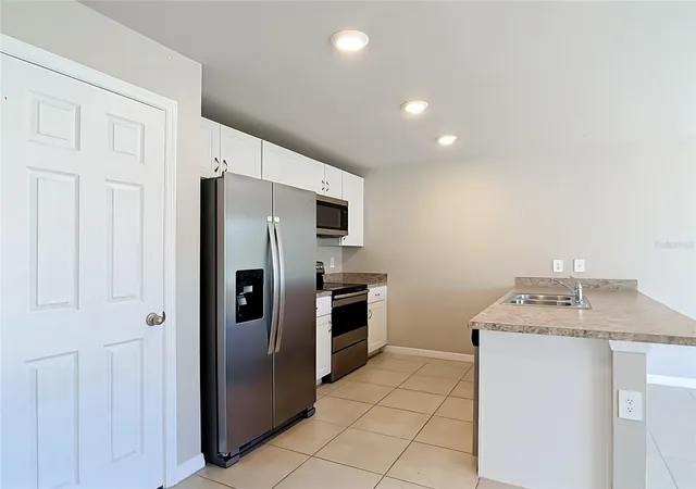 Photo 2 of Single family home for sale at 21499 Landis Ave, Port Charlotte, FL 33954 | MLS# A4709573 | Listing updated on 2026-10-28