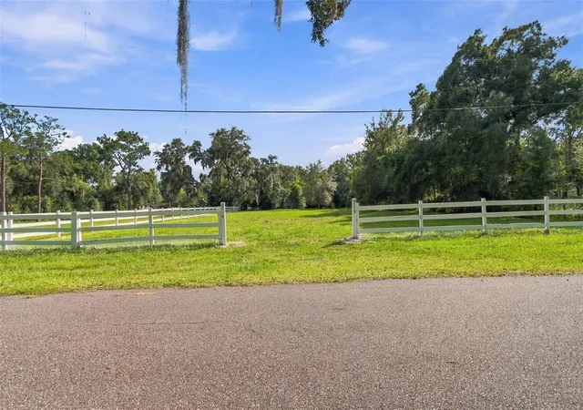 Photo 1 of Land for sale at Rhea Dr, Odessa, FL 33556 | MLS# TB8558081 | Listing updated on 2026-10-21