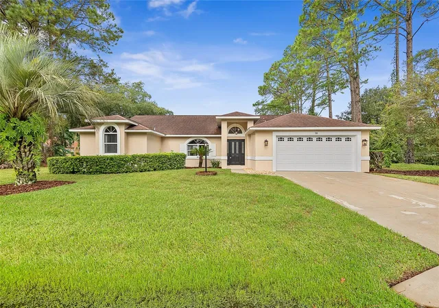 Photo 1 of Single family home for sale at 58 Evans Dr, Palm Coast, FL 32164 | MLS# FC322118 | Listing updated on 2026-10-15
