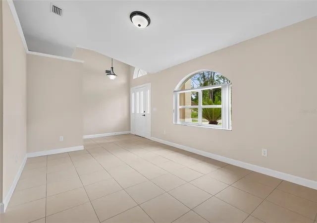 Photo 2 of Single family home for sale at 58 Evans Dr, Palm Coast, FL 32164 | MLS# FC322118 | Listing updated on 2026-10-15