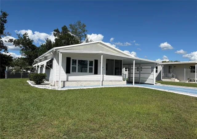 Photo 2 of Manufactured home for sale at 7507 Dinsmore St, Brooksville, FL 34613 | MLS# W7890326 | Listing updated on 2026-10-15