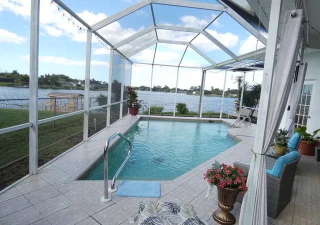 Photo 2 of Single family home for sale at 7655 Vienna Ln, Port Richey, FL 34668 | MLS# W7890327 | Listing updated on 2026-10-22
