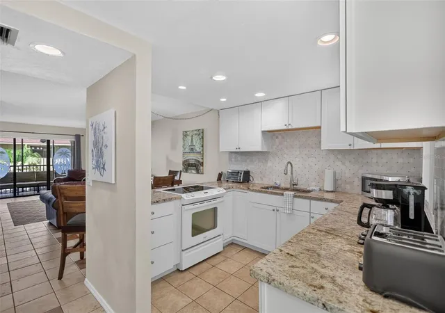 Photo 4 of Condo for sale at 6157 Midnight Pass Rd #E53, Sarasota, FL 34242 | MLS# A4709629 | Listing updated on 2026-10-21