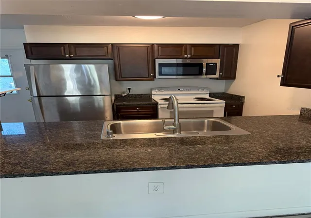 Photo 2 of Townhouse for sale at 7034 SW 17th Place, Gainesville, FL 32607 | MLS# GC544188 | Listing updated on 2026-10-16