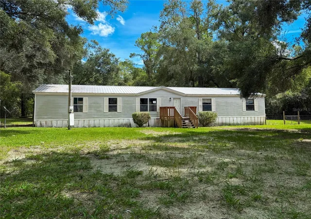 Photo 1 of Manufactured home for sale at 19413 Sw State Rd 47, Fort White, FL 32038 | MLS# GC544189 | Listing updated on 2026-10-26
