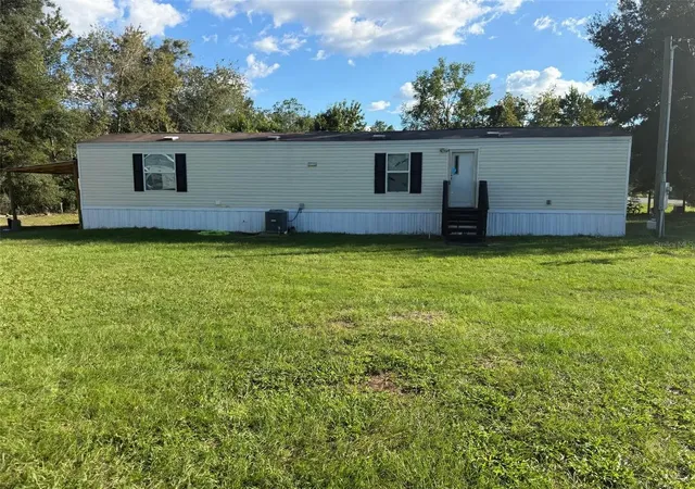 Photo 1 of Manufactured home for sale at 1821 Nw 110th Court, Ocala, FL 34482 | MLS# OM734059 | Listing updated on 2026-10-18