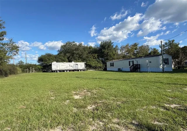 Photo 3 of Manufactured home for sale at 1821 Nw 110th Court, Ocala, FL 34482 | MLS# OM734059 | Listing updated on 2026-10-18