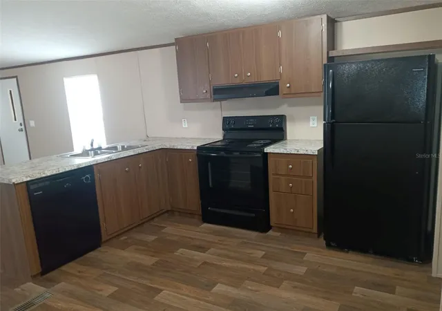 Photo 4 of Manufactured home for sale at 1821 NW 110th Court, Ocala, FL 34482 | MLS# OM734059 | Listing updated on 2026-10-18