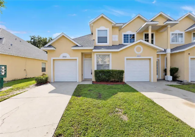 Photo 1 of Townhouse for sale at 2412 Temple Grv Ln, Kissimmee, FL 34741 | MLS# O6450035 | Listing updated on 2026-10-17