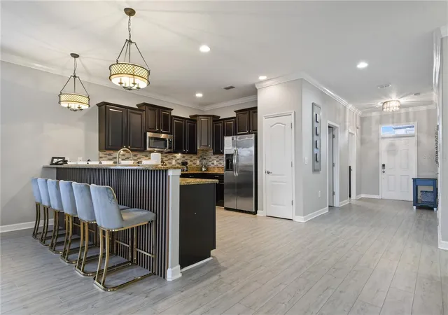 Photo 4 of Single family home for sale at 1415 Moon Valley Dr, Davenport, FL 33896 | MLS# O6450039 | Listing updated on 2026-10-15