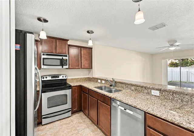 Photo 3 of Townhouse for sale at 9726 Trumpet Vine Loop, Trinity, FL 34655 | MLS# TB8558273 | Listing updated on 2026-10-20