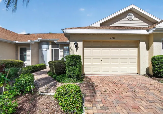 Photo 1 of Condo for sale at 2433 New Hvn Cir, Sun City Center, FL 33573 | MLS# TB8558380 | Listing updated on 2026-10-17