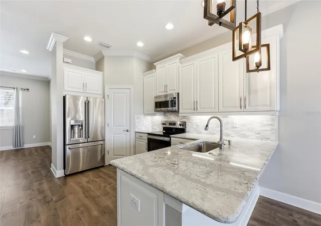 Photo 3 of Townhouse for sale at 6072 Moorings Dr S, Saint Petersburg, FL 33712 | MLS# TB8558410 | Listing updated on 2026-10-22