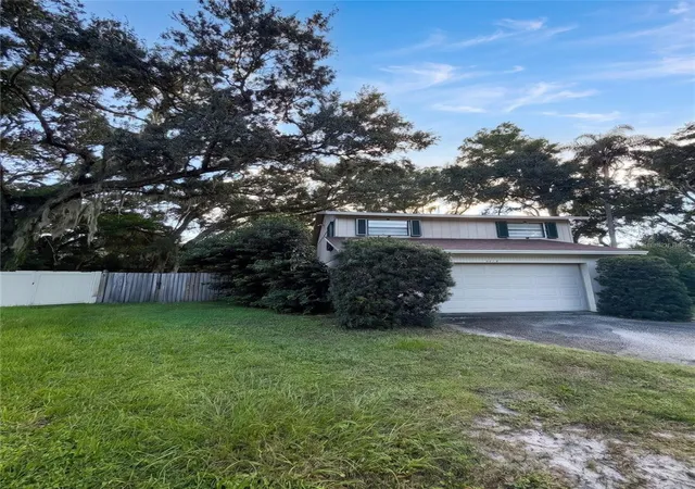 Photo 1 of Single family home for sale at 14714 Oak Vine Dr, Lutz, FL 33559 | MLS# TB8558426 | Listing updated on 2026-10-17