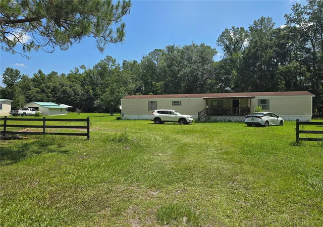 Photo 1 of Manufactured home for sale at 11693 Nw County Rd 229, Lake Butler, FL 32054 | MLS# O6450232 | Listing updated on 2026-10-16
