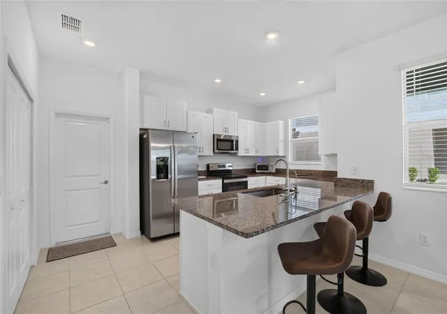 Photo 4 of Townhouse for sale at 12428 Crystal Jade Way, Parrish, FL 34219 | MLS# TB8558489 | Listing updated on 2026-10-30
