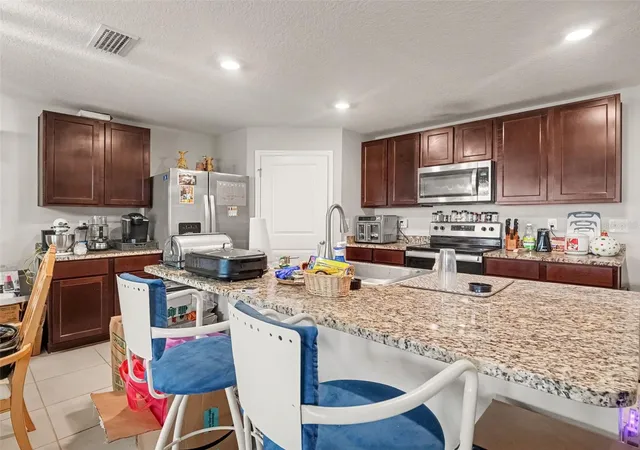 Photo 3 of Single family home for sale at 10318 Moosehead Dr, Parrish, FL 34219 | MLS# TB8558521 | Listing updated on 2026-10-27