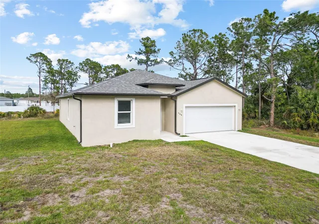 Photo 1 of Single family home for sale at 566 Woodview Dr, Lehigh Acres, FL 33972 | MLS# TB8558568 | Listing updated on 2026-10-17