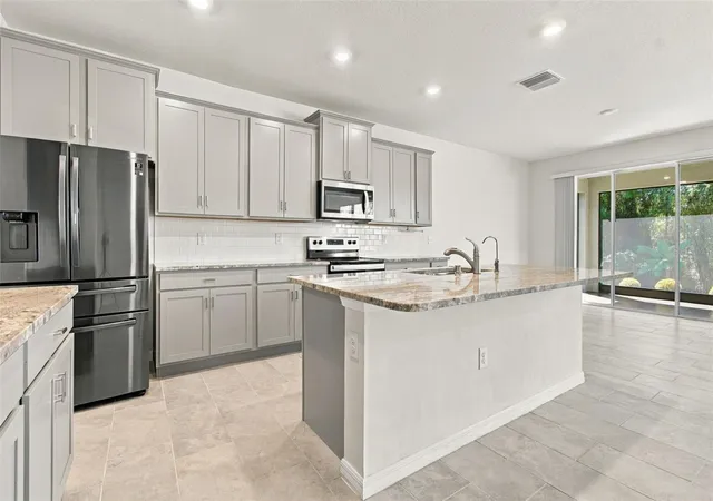 Photo 4 of Single family home for sale at 3221 Living Coral Dr, Odessa, FL 33556 | MLS# TB8558612 | Listing updated on 2026-10-21