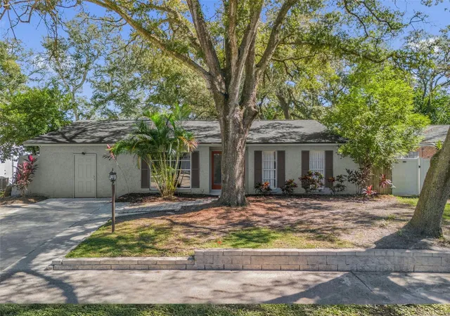 Photo 1 of Single family home for sale at 9627 Hidden Oaks Cir, Tampa, FL 33612 | MLS# O6450367 | Listing updated on 2026-10-27