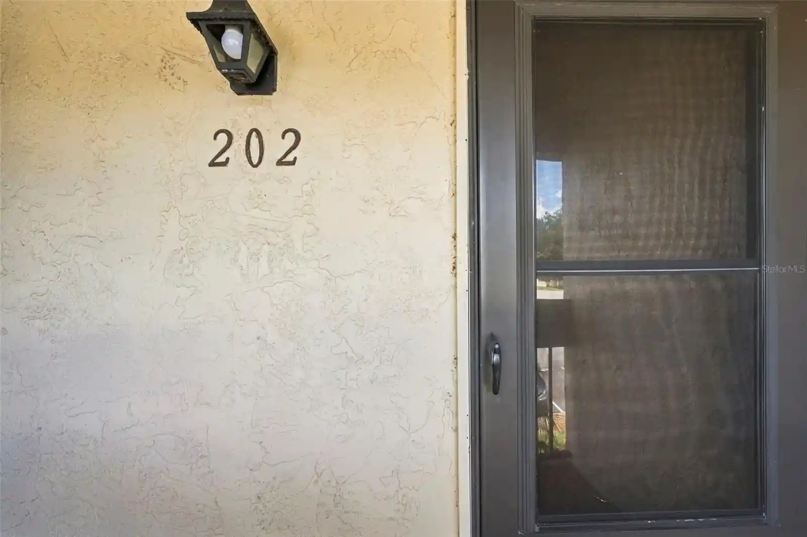 Listing Photo 1 - Condo for sale in 2400 Winding Creek Blvd located at 2400 Winding Creek Blvd, Clearwater, FL 33761 - Unit #3-202