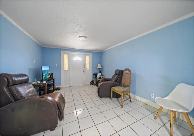 Photo 2 of Single family home for sale at 2922 Sample Loop, Tampa, FL 33619 | MLS# A4709782 | Listing updated on 2026-10-17