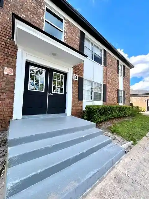 Listing Photo 1 - Condo for sale in 5325 Curry Frd Rd located at 5325 Curry Frd Rd, Orlando, FL 32812 - Unit #B205