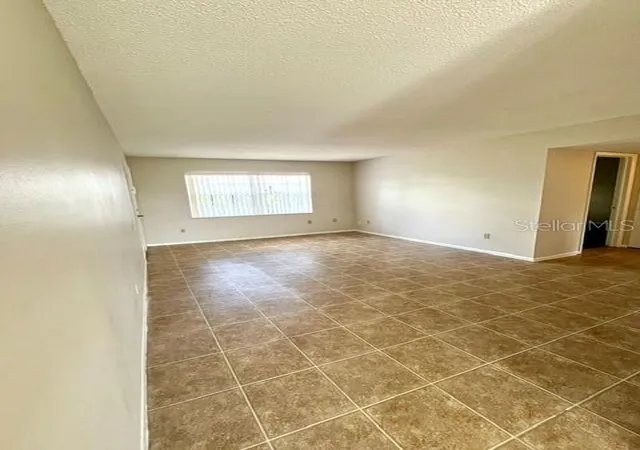 Photo 1 of Condo for sale at 5325 Curry Frd Rd #B205, Orlando, FL 32812 | MLS# S5159652 | Listing updated on 2026-10-21