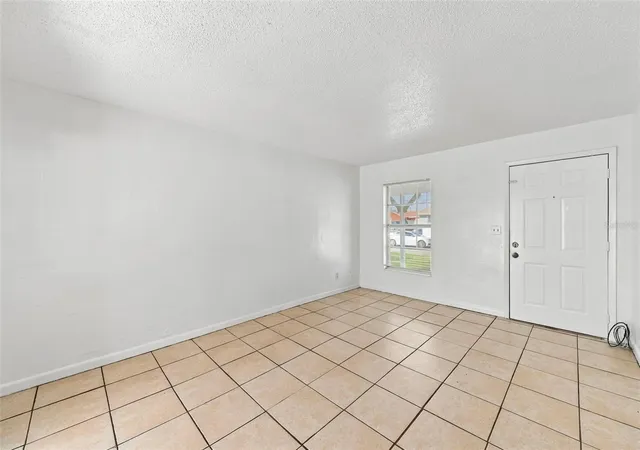 Photo 3 of Single family home for sale at 8527 Gold Ridge Cir, Tampa, FL 33619 | MLS# TB8558706 | Listing updated on 2026-10-21