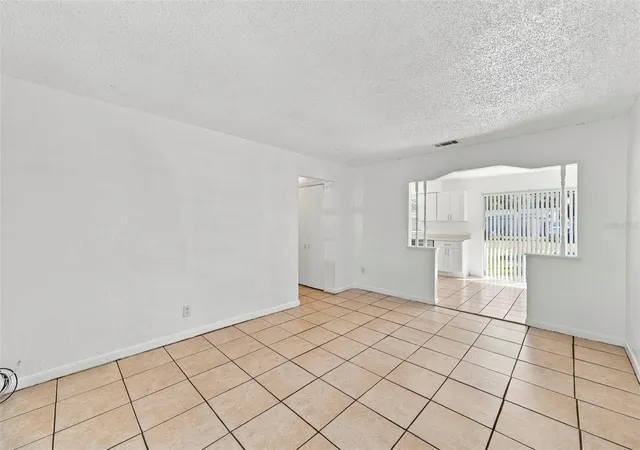Photo 4 of Single family home for sale at 8527 Gold Ridge Cir, Tampa, FL 33619 | MLS# TB8558706 | Listing updated on 2026-10-21
