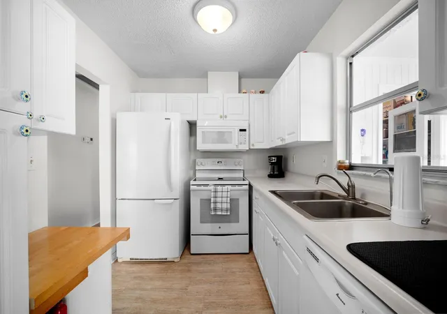 Photo 1 of Condo for sale at 1906 Canterbury Ln #32, Sun City Center, FL 33573 | MLS# TB8558787 | Listing updated on 2026-10-22