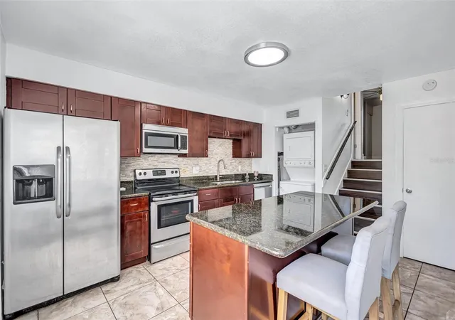 Photo 3 of Townhouse for sale at 4515 La Capri Ct, Tampa, FL 33611 | MLS# TB8558820 | Listing updated on 2026-10-17