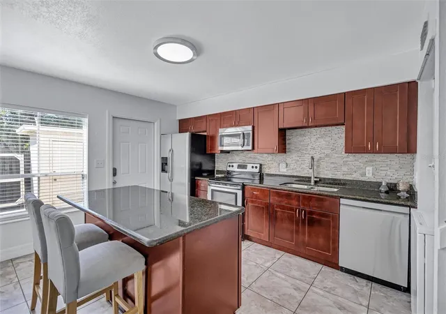 Photo 4 of Townhouse for sale at 4515 La Capri Ct, Tampa, FL 33611 | MLS# TB8558820 | Listing updated on 2026-10-17