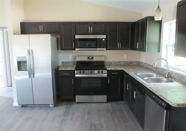 Photo 1 of Single family home for sale at 5789 NW 5th Street, Ocala, FL 34482 | MLS# OM734176 | Listing updated on 2026-10-21