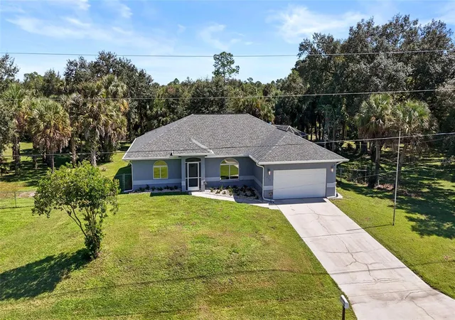 Single family home for sale at 418 Edison Ave, LEHIGH ACRES, FL 33972 | MLS# C7532131