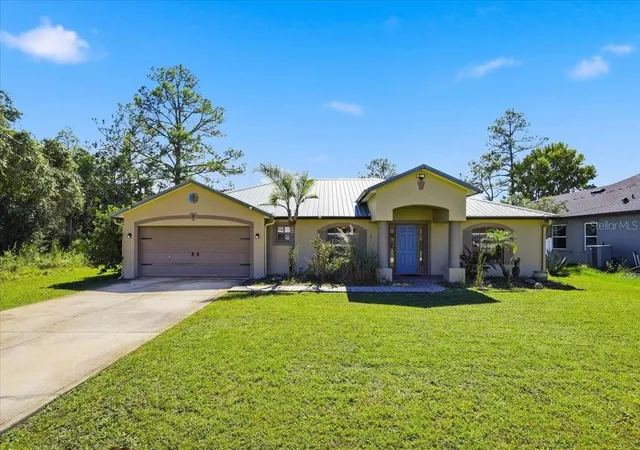 Photo 1 of Single family home for sale at 92 Robinson Dr, Palm Coast, FL 32164 | MLS# FC322181 | Listing updated on 2026-10-24