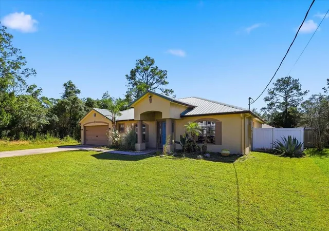 Photo 3 of Single family home for sale at 92 Robinson Dr, Palm Coast, FL 32164 | MLS# FC322181 | Listing updated on 2026-10-24