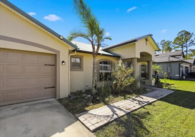 Photo 3 of Single family home for sale at 92 Robinson Dr, Palm Coast, FL 32164 | MLS# FC322181 | Listing updated on 2026-10-24