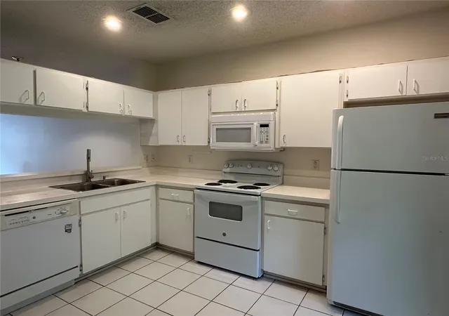 Photo 1 of Townhouse for sale at 8627 Hunters Key Cir, Tampa, FL 33647 | MLS# A4709937 | Listing updated on 2026-10-18