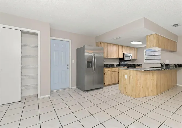 Photo 4 of Single family home for sale at 7752 Royal Stewart Dr, New Port Richey, FL 34653 | MLS# O6450656 | Listing updated on 2026-10-18