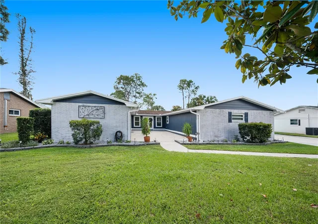 Photo 1 of Single family home for sale at 1321 Lake Miriam Dr, Lakeland, FL 33813 | MLS# TB8559092 | Listing updated on 2026-10-18
