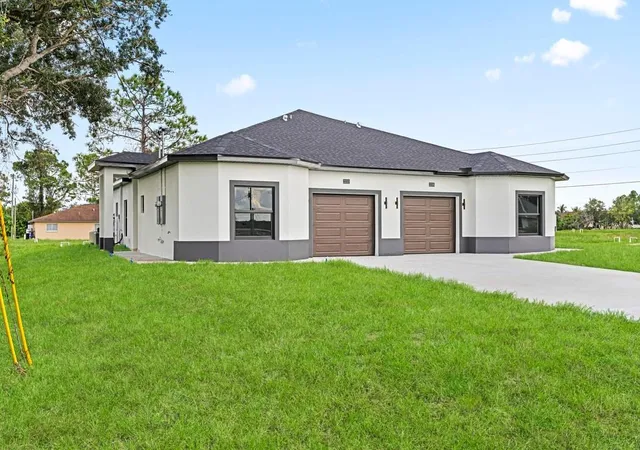 Photo 2 of House for sale at 2235 Wayne Ave S, Lehigh Acres, FL 33973 | MLS# TB8559135 | Listing updated on 2026-10-23