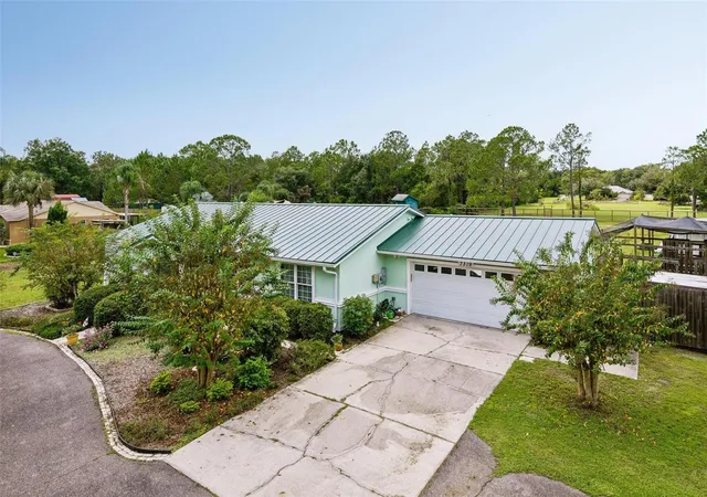 Photo 2 of Single family home for sale at 7319 Drifting Sand Dr, Wesley Chapel, FL 33544 | MLS# O6450719 | Listing updated on 2026-10-18