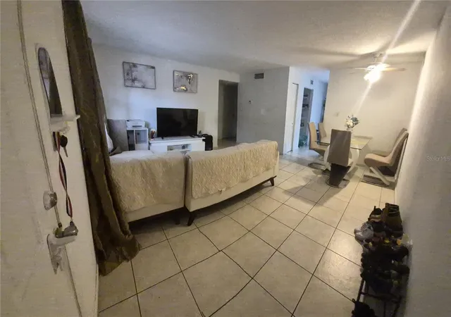 Listing Photo 1 - Condo for sale in building located at 202 Poinsettia Pine Ct, TAMPA, FL 33612 - Unit #202