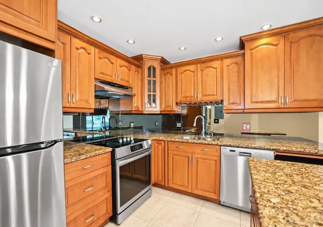 Photo 3 of Condo for sale at 2000 World Pkwy Blvd #2, Clearwater, FL 33763 | MLS# TB8559161 | Listing updated on 2026-10-23