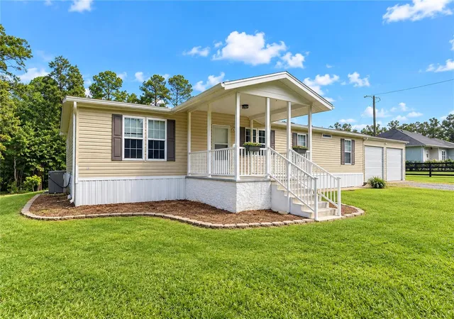 Photo 3 of Manufactured home for sale at 5125 NE County Rd 1469, Hawthorne, FL 32640 | MLS# GC544245 | Listing updated on 2026-10-21