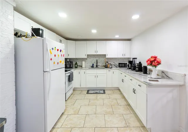 Photo 2 of Single family home for sale at 8819 W Broad St, Tampa, FL 33615 | MLS# TB8559239 | Listing updated on 2026-10-20