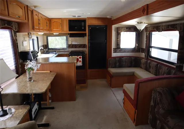 Photo 3 of Manufactured home for sale at 9431 Cougar Dr, Weeki Wachee, FL 34613 | MLS# W7890423 | Listing updated on 2026-10-19