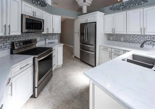 Photo 4 of Single family home for sale at 5100 SW 111th Lane Rd, Ocala, FL 34476 | MLS# OM734245 | Listing updated on 2026-10-21