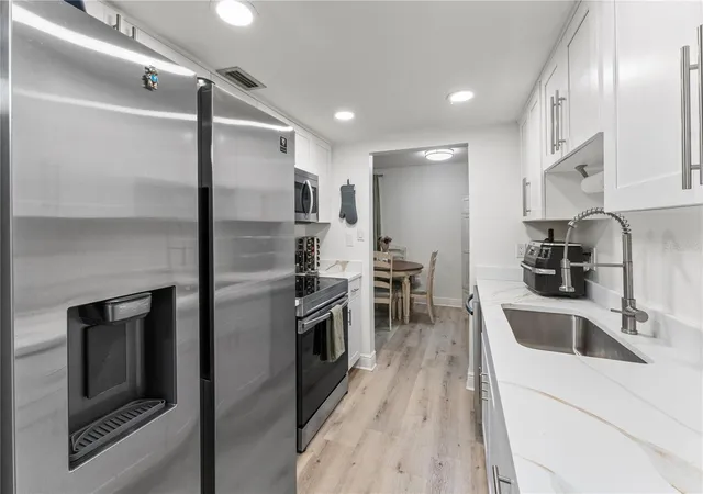 Listing Photo 4 - Condo for sale in building located at 11538 7Th Ln N, ST PETERSBURG, FL 33716 - Unit #1303